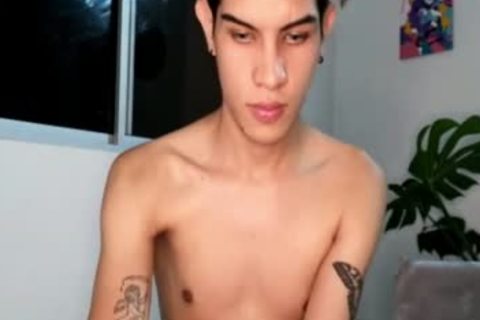 Skinny Latino twink With Tattoos And Earings Teases On cam