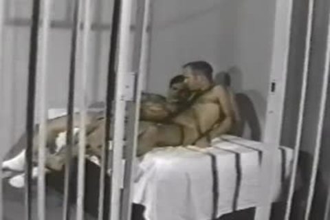 bushy lad team-slammed in jail cell